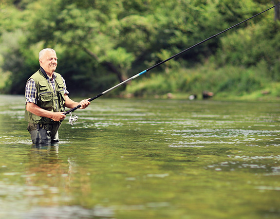 elderly fisherman fishing